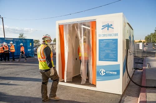 World’s First Opti-Clean Cube Helps Construction Sites Fight COVID-19